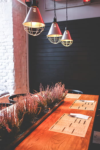 three, round, gray, pendant lamps, turned, rectangular, brown, wooden, table, restaurant, vintage