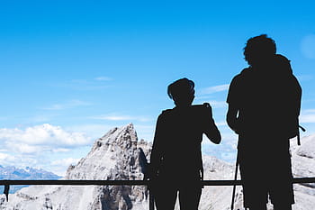 two, persons, overlooking, mountain ranges, silhouette, person, looking, rocky, mountain, top, blue