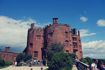 people, standing, brown, concrete, castle, brick, building, architecture, infrastructure, blue, sky