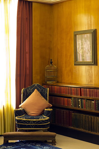 south, london, Eltham Palace, South London, sitting room, cautauld family home, art deco furniture, bookcase, wall panelling, bird cage, domestic Room