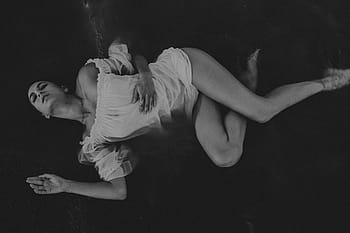 grayscale photography, woman, lying, water, hands, tummy, people, flexible, chill, relax, pose