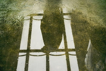 selective, focus photography, shadow, stone, floor, water, puddle, reflection, people