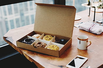 doughnut in box, food, doughnut, sweets, dessert, coffee, mobile, phone, table, food and drink, indoors