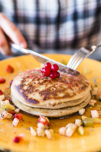 person eating pancake, pancake, food, breakfast, snack, fruits, fork, knife, eat, meal, gourmet