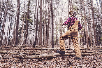 person, wearing, brown, denim overalls, standing, trees, daytime, denim, overalls, people, nature
