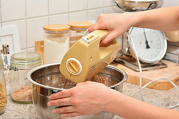 man, using, electric, mixer, touching, gray, stainless, steel bowl, hands, stir, dough stir