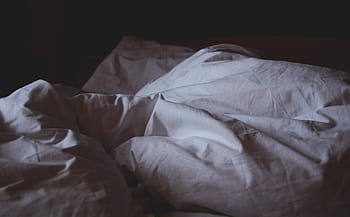 white bed comforter, bed linen, awake, crumpled, sheets, bedsheets, first light, shadows, disturbed, tired, resting