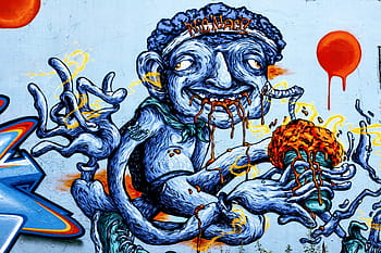 monster eating painting, grafitti, graffiti, street art, colorful, color, spray, wall