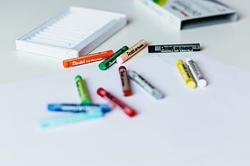 assorted-color pentel crayons, white, surface, crayons, color, colorful, art, box, table, blur