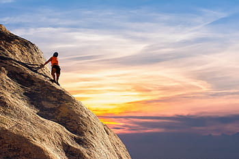 person, climbing, rock mountain, daytime, climbing rock, mountain climber, sky, landscape, climber, mountain, sport