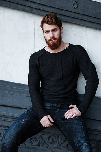 man, wearing, black, long-sleeve shirt, leaning, wall, red hair, beard, red beard, redhead, portrait