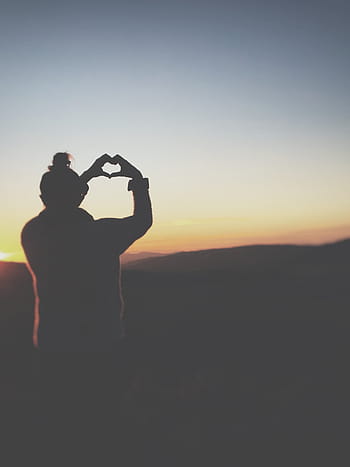 silhouette, person, heart hand gesture, people, woman, bun, nature, clouds, sky, sunset, mountain