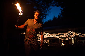 man, holding, light torch, torch, night, time, people, guy, fire, flame, dark