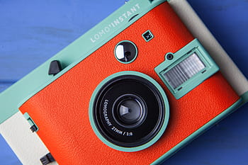 retro, style film camera, lens, captured, canon 5, 5d, blue, wood desk, Close-up shot, retro style, film camera