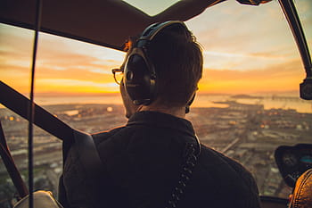 pilot, inside, cockpit, golden, hour, man, s, wearing, black, headphones, looking