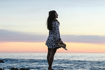 woman, standing, rock floor, sea, ocean, water, waves, nature, horizon, beach, shore