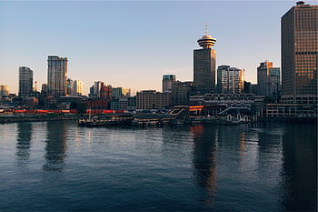calm, sea water, high-rise, buildings, daytime, high, rise, near, body, water, blue