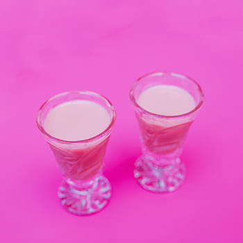 two, pink, beverages, surface, shot, glasses, filled, beige, liquids, table, drinks