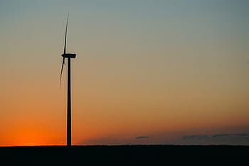 silhouette of windmill, windmill, silhouette, sunset, dusk, sky, orange, landscape, alternative energy, wind power, wind turbine