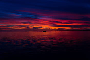 boat, sea, red, blue, sky, lone, light, sunset, dusk, clouds, ocean