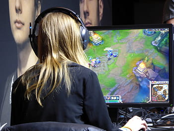 woman, wearing, black, long, sleeve, top, front, computer, monitor, playing, league