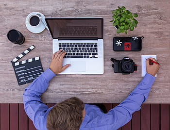 person, writing, paper, macbook, pro, table, filmmaker, youtuber, script, screenwriter, storyboard