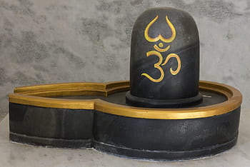 close-up photo, black, brown, wooden, lingam altar, shivling, india, prayer, blessing, hinduism, hindu