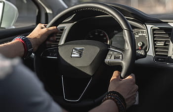 person, holding, steering wheel, seat car, seat leon, ecomotive, 2017, interior, fancy, luxury, steering