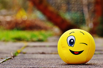 yellow, emoji ball, floor, daytime, smiley, wink, funny, sweet, cute, face, fun
