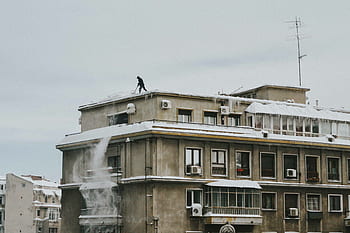 architecture, building, infrastructure, people, man, alone, rooftop, snow, winter, sky, cold