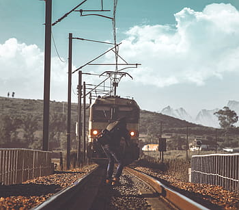 person, capturing, moving, train, railroad, daytime, standing, railway, transportation, track, fence
