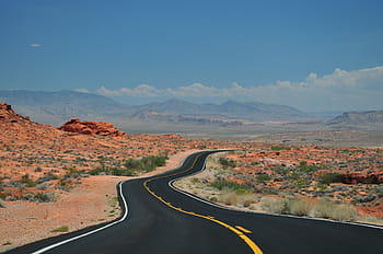 asphalt road, middle, land, black, asphalt, road, surrounded, dessert, sunny, sky, rural