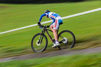 time lapse photo, biker, road, man, white, blue, long, sleeve, shirt, short, riding