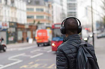 man, standing, street, people, guy, travel, city, black, headphone, backpack, urban