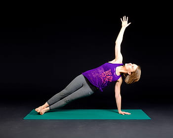 woman, wearing, purple, tank, top, gray, leggings, yoga position, green, yoga mat, plank