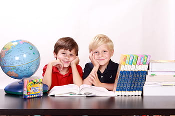 boys, wearing, red, black, polo shirt, boy, red and black, polo shirts, in between, globe, crayons