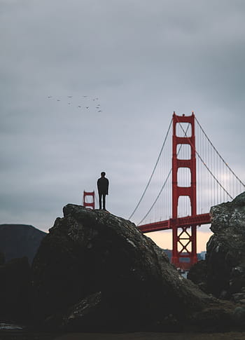 person, standing, rock formation, golden, gate bridge, stone, near, gate, people, man, alone