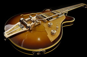 brown electric guitar, e guitar, instrument, music, rock music, musical instrument, musical instrument string, string instrument, black background, guitar, studio shot