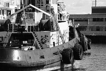 fishing boat, ship, pier, dock, port, harbor, harbour, tires, ladders, steps, ropes