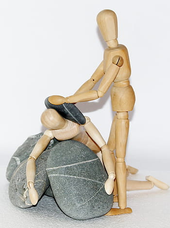 two, brown, wooden, mannequins, gray, stone, wooden figures, stones, plunge, help, helplessness