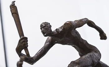 ng of the hill, olympic sculpture, torchbearer