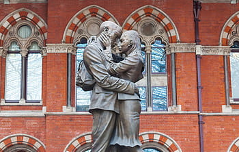 The Meeting Place, St Pancras, kissing, couple, statue, bronze, lovers, only men, one man only, adult, adults only