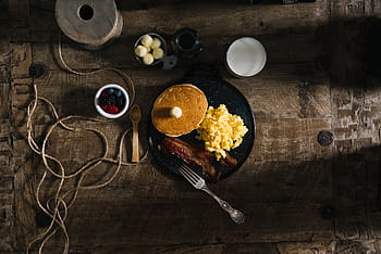 pancake on plate, fired, rice, pancake, round, black, ceramic, plate, food, eat, breakfast