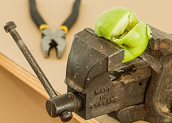 green, fruit, black, bench vise, stress, tension, pressure, stressing, pain, strain, crack up