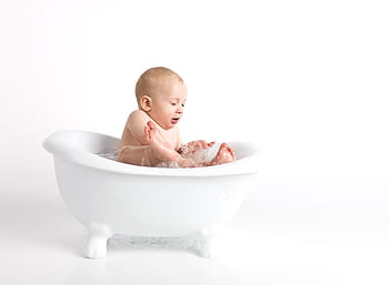 child-baby-minimalist-white-background-cute-portrait-royalty-free-thumbnail.jpg