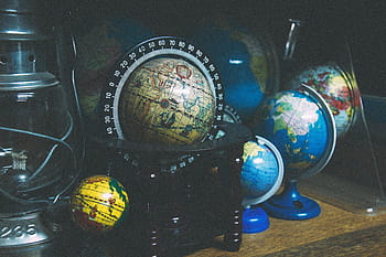 assorted, globes, wooden, table, black, floor, globe, world, travel, map, trip