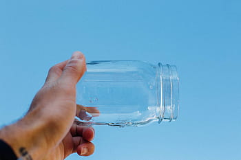 person, holding, clear, glass mason jar, glass, transparent, hand, wall, wet, water, human hand