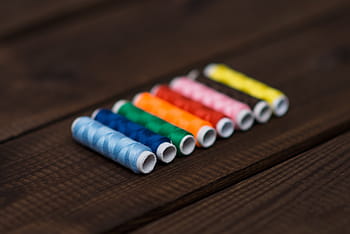assorted-color threads, floor, multicolored, sewing, treads, thread, spools, string, colors, colours, multi colored