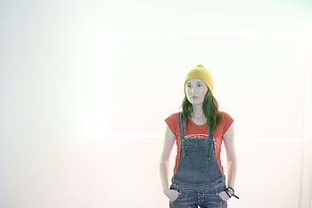 tv show, still, screenshot, woman, wearing, red, shirt, yellow, beanie, blue, jumpsuit