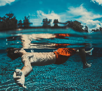 man, back, floating, body, water, daytime, underwater, photography, blue, sky, people